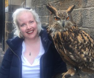 Claire posing with owl