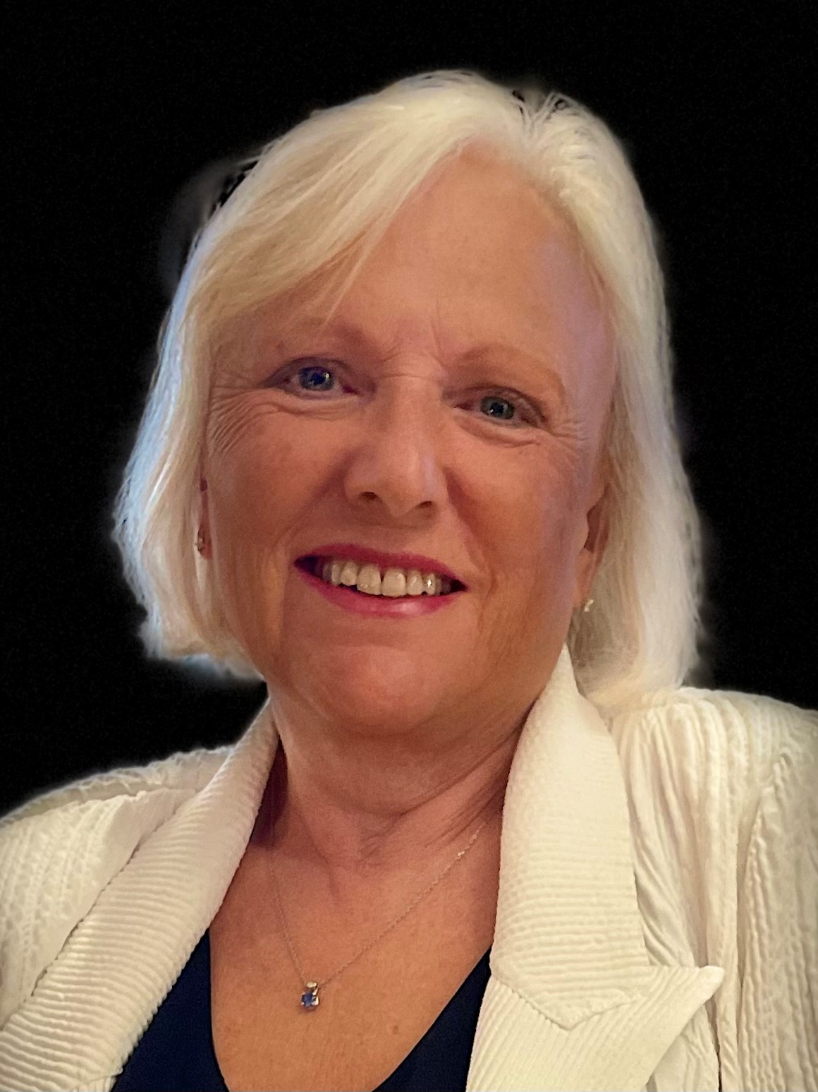 Professional headshot of Janet Cooper, Treasurer
